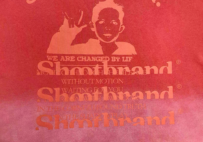 丝网印花+水洗喷色做旧工艺图案